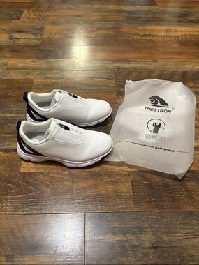 Thestron White Golf Shoes with Black Accents